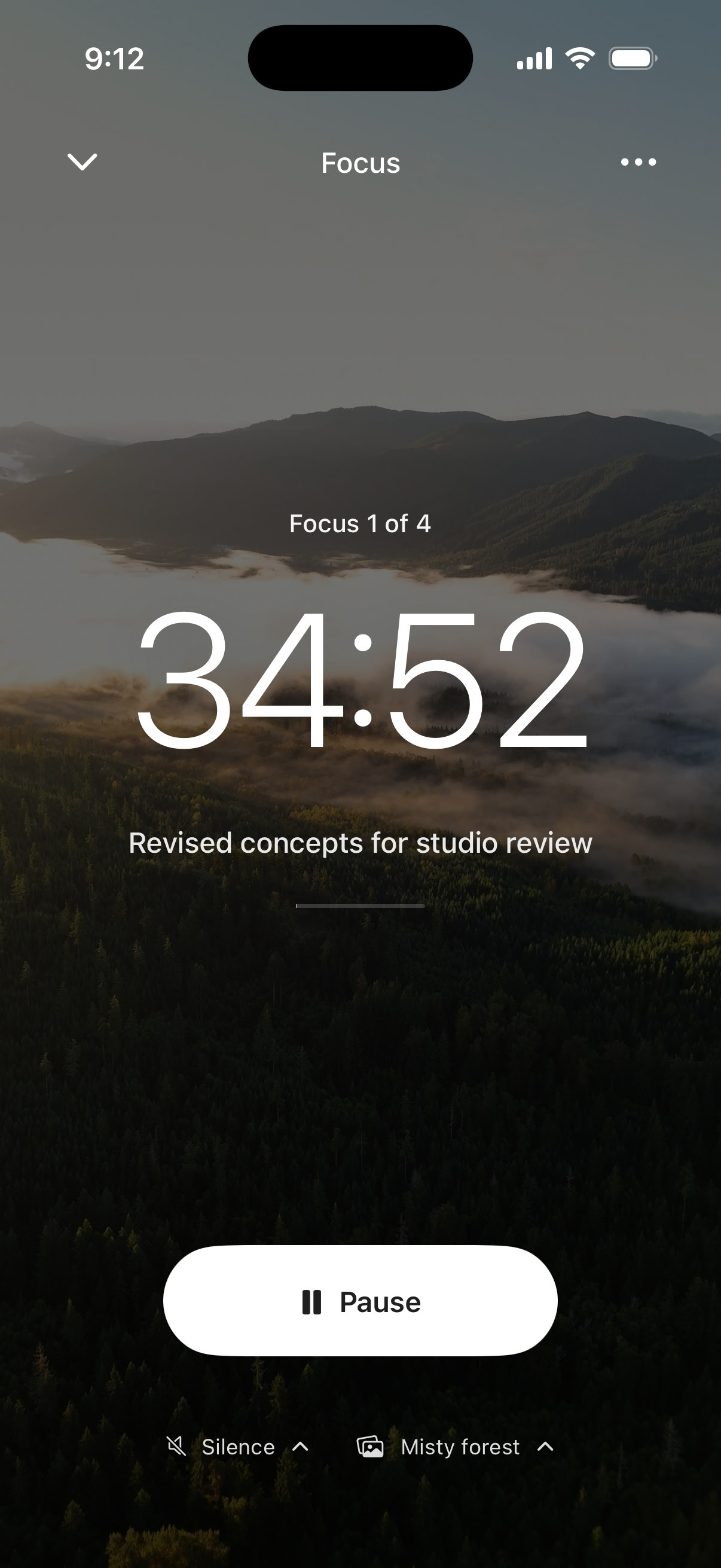 Ordo Focus on iPhone: Focus 1 of 4, 35:00 on one task, revised concepts for studio review, over a misty forest, with Pause.